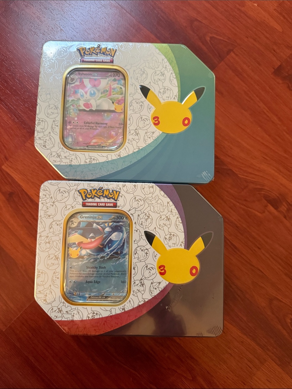 Pokémon Kids Accessories Tins (2)- Pikachu 30th Anniversary Sylveon and Greninja